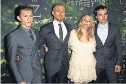  ??  ?? Actors Tom Holland, left, Charlie Hunnam, Sienna Miller and Robert Pattinson attend the Hollywood premiere of The Lost City of Z.