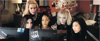  ?? PHOTOS: WARNER BROS. ?? Sandra Bullock, left, Sarah Paulson, Rihanna, Cate Blanchett and Awkwafina in Ocean’s 8, where the characters never mesh or even relax.