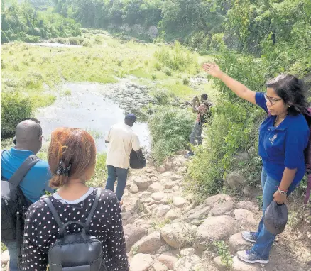  ??  ?? Dr Arpita Mandal (right) in discussion with team members inside the Upper Rio Minho Watershed.