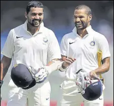  ?? HT PHOTO ?? India coach Ravi Shastri said Vijay (L) brings in solidity at the top while Shikhar adds variety as an opener.