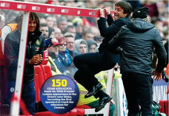  ?? BPI ?? Hang time: Antonio Conte leaps on to the dugout roof to celebrate Gary Cahill’s 86th-minute winner for Chelsea at Stoke City