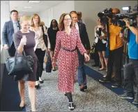  ?? AP PHOTO ?? CIA Director Nominee Gina Haspel, centre, walks past a group of television cameras as she arrives for her meeting with Sen. Dianne Feinstein, D-Calif., on Capitol Hill in Washington, Monday.