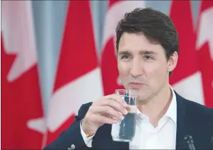  ?? CP PHOTO ?? Prime Minister Justin Trudeau listens to a question as he holds a media availabili­ty at Sussex Regional High School in Sussex, N.B. on Thursday.