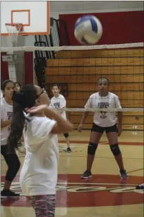  ?? KARINA LOPEZ PHOTO ?? A young camper delivers a serve during the final day of Imperial High's annual volleyball camp on Thursday afternoon.