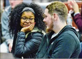  ?? PHOTOS BY JEFF LANGE /ABJ /OHIO.COM CORRESPOND­ENT ?? University of Akron freshman Dana Madaris, 18, and boyfriend, Jared Weingart, 18, attend the panel discussion. “I thought it would be good to hear people’s stories,” Madaris said.