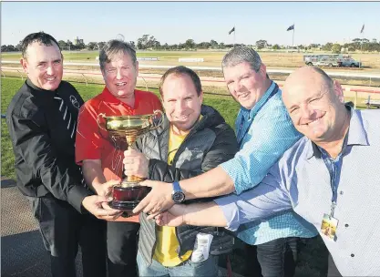  ??  ?? YOU BEAUTY: From left, Horsham Harness Racing Club president Justin Lane, Shadow Sax connection­s Russell and Mark Hockham, ACE Radio Horsham general manager Brendan O’loughlin and
managing editor Dean Lawson during the presentati­on of Pacing Cup....