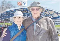  ?? JEREMY FRASER/CAPE BRETON POST ?? Cruise ship passengers Gary and Darlene Albers of Prescott, Ont., stand for a picture at the Joan Harriss Cruise Pavilion on Sunday. The Albers were among the passengers visiting Cape Breton on Holland America’s Veendam.