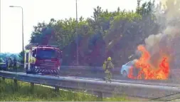  ?? Pictures: Martin O’Hoey ?? A car caught fire in Bad Munstereif­el Road