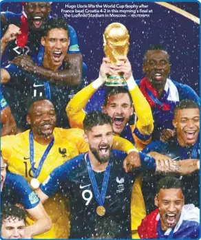  ??  ?? Hugo Lloris lifts the World Cup trophy after France beat Croatia 4-2 in this morning’s final at the Luzhniki Stadium in Moscow. –