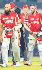  ??  ?? Kings XI Punjab’s big guns like captain Glenn Maxwell (R) and Hashim Amla (L) have not fired after winning their match against Royal Challenger­s Bangalore at the Holkar Stadium in Indore.