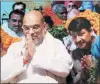  ?? Prem Nath Pandey ?? Amit Shah, Manoj Tiwari in Delhi, Tuesday.