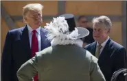  ?? ALEX BRANDON - ASSOCIATED PRESS ?? President Donald Trump tours the old Jamestown Settlement accompanie­d by Jamestown-Yorktown Foundation executive director Philip Emerson, right, Tuesday in Jamestown, Va.