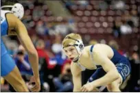  ?? NATE HECKENBERG­ER - FOR DIGITAL FIRST MEDIA ?? Spring-Ford’s Brandon Meredith eyes up Seneca Valley’s Louis Newell during an overtime loss at 120 pounds Saturday. Meredith won his 150th career bout earlier in the day.