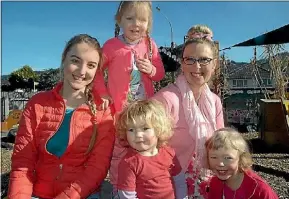  ??  ?? Elizabeth Ave Childcare Centre, from left Mackenzie Dyer, Lilah Cronin, back, Joshua Mitchell-King, head teacher Maureen Edhouse and Malina Tuboltsev, are ready for Hutt Valley Colour Day.