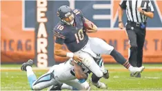  ?? DENNIS WIERZBICKI, USA TODAY SPORTS ?? The Panthers’ Shaq Green-Thompson sacks Mitchell Trubisky, but the defense sparked the Bears.