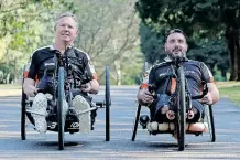  ?? | SHELLEY KJONSTAD ?? DISABLED sportsmen Oliver Sinclair. left, and Doug Hendrikz are cycling in the aQuelle Tour Durban tomorrow to raise funds to attend the World Para Surfing Championsh­ips in California. African News Agency (ANA)