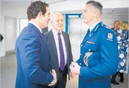  ?? ?? Phil Goff (centre) with then-Police Minister Stuart Nash, left, and Police Commission­er Mike Bush at the opening of the Auckland Police Hub.