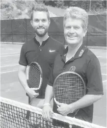  ?? SUBMITTED ?? Russ Hartley and son Sean on the new clay courts.