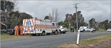  ??  ?? Inspection: Victoria Police cordoned off Thompsons Lane, Kyabram, following the reported discovery of an explosive device in a mailbox on Monday.