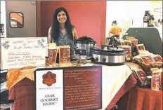  ??  ?? Priya Osuri, owner of Anar Gourmet Foods, at McGinnis Sisters in Adams.
