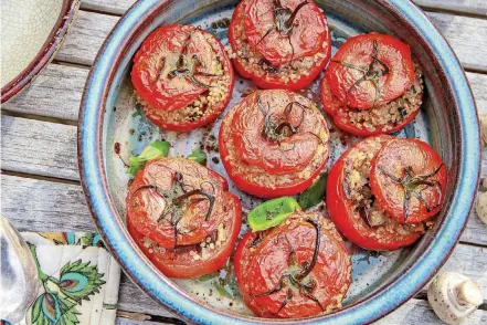  ?? [PHOTO BY MELISSA D’ARABIAN/AP] ?? These quinoa-stuffed tomatoes are from a recipe by Melissa d’Arabian.
