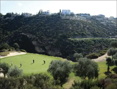  ??  ?? David Drysdale putts on the seventh green at the Aphrodite Hills Cyprus Open