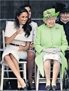  ??  ?? All smiles: the Queen seemed to enjoy spending time with the new Duchess of Sussex