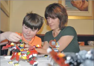  ??  ?? Rufus Smith can build complex Lego models but has difficulty reading the time on a clock face.