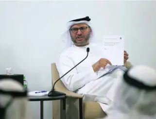  ?? Ravindrana­th K / The National ?? Dr Anwar Gargash, Minister of State for Foreign Affairs, says the UAE, a major transit centre, is on high alert to fight human traffickin­g. He unveiled a report on the crime yesterday.