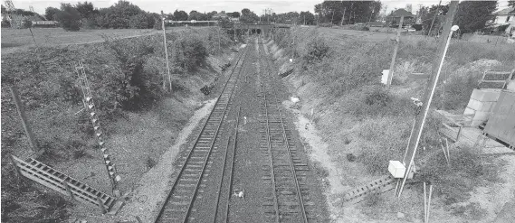  ?? PHOTOS: DAN JANISSE ?? According to U.S. court documents, Juan Antonio Garcia-Jimenez of Windsor counselled five people to climb down onto the tracks to the CP Rail tunnel in Windsor and walk to the United States — an illegal and risky crossing which resulted in their detentions. Garcia-Jimenez was arrested Wednesday while crossing legally into the United States.