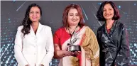  ??  ?? HNB Chief Transforma­tion Officer Chiranthi Cooray with the award in the presence of (from left) MORS Group CEO Shanggari Balakrishn­an and ACES Awards Jury Panel Member Dr. Jayanthi Desan