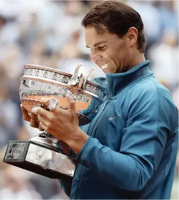  ?? Picture: EPA ?? Thiem in Paris yesterday. Rafael Nadal takes a moment to enjoy his 11th French Open title after beating Dominic