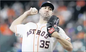  ?? DAVID J. PHILLIP/AP ?? Astros ace Justin Verlander delivers against the Tigers, his former team, on Wednesday.