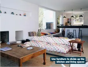  ??  ?? Use furniture to divide up the kitchen and living spaces