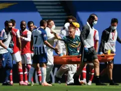  ?? (PA) ?? Bernd Leno confronts Neal Maupay as he leaves the field