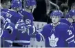  ?? VERONICA HENRI/POSTMEDIA NETWORK ?? William Nylander, right, and the Leafs celebrate the forward’s second goal of the game in the Leafs’ win over the Tampa Bay Lightning on Monday.