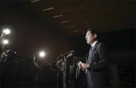  ?? KYODO NEWS VIA AP ?? Japanese Prime Minister Fumio Kishida speaks to reporters in Tokyo on Saturday following North Korea's missile firing. Kishida called it “an act of violence that escalates provocatio­n toward the internatio­nal order.”
