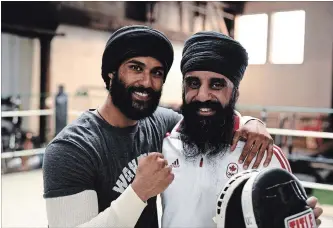  ?? R3M PRODUCTION­S THE CANADIAN PRESS ?? Prem Singh, left, and Pardeep Singh Nagra on the set of the film "Tiger,” which is about Singh Nagra’s fight inside and outside the ring as a Sikh boxer in Ontario. He says the issues he faced years ago are ongoing.