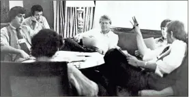  ?? / AP-Pool, File ?? Jimmy Carter, center, meets with his staff in July 1976, from back left, Pat Caddell, Jerry Rafshoon, his son, Chip and Jody Powell, and front left, Pat Anderson, at the Americana Hotel in New York. Caddell, the pollster who helped propel Jimmy Carter in his longshot bid to win the presidency has died at age 68, a colleague said Saturday night. Caddell died Saturday after suffering a stroke.