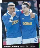  ?? ?? SPOT CHECKS Tavernier praises Wright on his second goal before adding a killer penalty third (right)