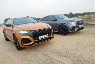  ??  ?? Ballistic behemoths go head to head: the Audi RSQ8 and Mercedes-AMG GLE 63 S.