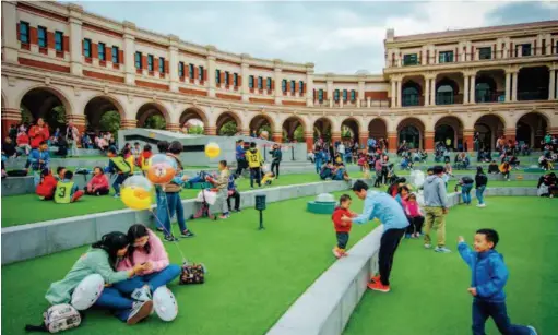  ??  ?? October 2, 2017: Tourists at Minyuan Stadium, a Tianjin culture center which used to host football matches and art performanc­es. Spending during China’s one-week National Day holidays has witnessed steady and rapid growth in recent years. VCG