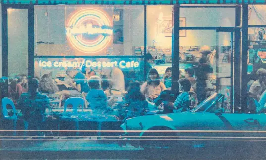  ?? COURTESY OF FLYING STAR ?? A shot of the original Double Rainbow’s neon sign in Nob Hill in 1989. The restaurant would eventually expand its menu and change its name to Flying Star Cafe.