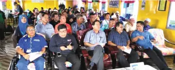  ??  ?? Harden (seated front row, centre) and other dignitarie­s at the simulation and training programme.