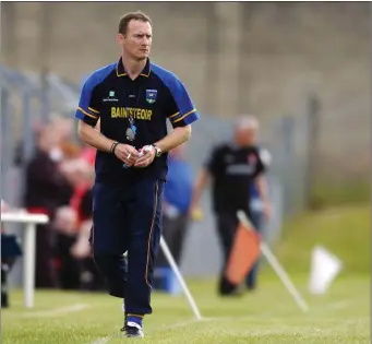  ??  ?? Wicklow boss Hugh Kenny prowls the sideline in Aughrim during the 2004 campaign.
