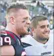  ?? ASSOCIATED PRESS FILE PHOTO ?? Houston Texans defensive end J.J. Watt (99) stands on the field next to his brother San Diego Chargers fullback Derek Watt (34) after the Texans defeated the Los Angeles Chargers 27to 20in a 2019game in Carson, Calif.