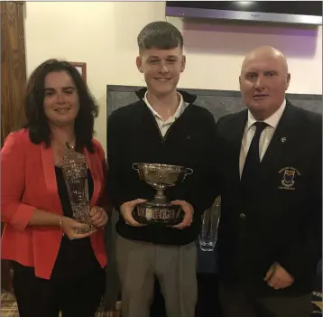  ??  ?? Winner of the Intermedia­te Scratch Cup at Wicklow Golf Club Keith Carty with sponsor Clodagh Doyle of Irish House Kilcoole and Wicklow Golf Club captain Gerry Doyle.