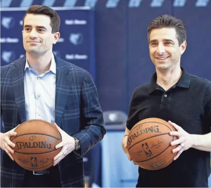  ?? MARK WEBER/THE COMMERCIAL APPEAL ?? The Grizzlies’ new Executive Vice President of Basketball Operations Zach Kleiman, left, and new franchise President Jason Wexler pose for a photo during a press conference Apr. 12, 2019 at the Fedexforum.