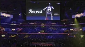  ?? AP ?? A tribute to Kobe Bryant is shown during a moment of silence before a game between the Cleveland Cavaliers and the New Orleans Pelicans on Tuesday in Cleveland.