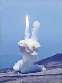  ?? [MATT HARTMAN] ?? A rocket designed to intercept an interconti­nental ballistic missile is launched Tuesday from Vandenberg Air Force Base in California. The Pentagon said the rocket did its job.